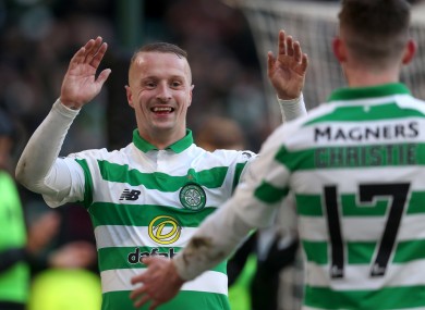 Leigh Griffiths celebrates scoring his side's third goal .