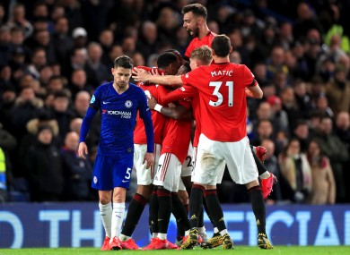 Manchester United players celebrate after team mate Anthony Martial (second left) scores.