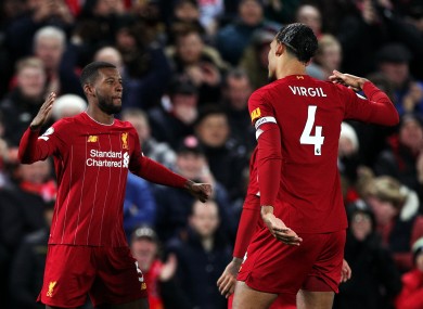 Liverpool's Georginio Wijnaldum (left) celebrates scoring.