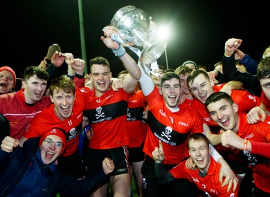 UCC players celebrate their Fitzgibbon Cup victory.