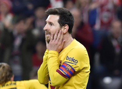 Lionel Messi reacts to a missed chance.