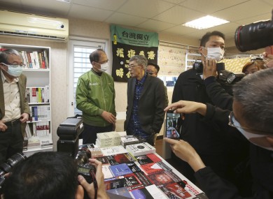 Lam Wing-kee (center right) and staff at the Causeway Bay Book shop is congratulated by Taiwan's Legislative Yuan Speaker Yu Shyi-kun (center left).