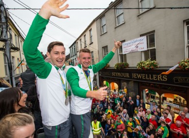 Olympic medallists Paul and Gary O’Donovan parade through Skibbereen on an open top bus.