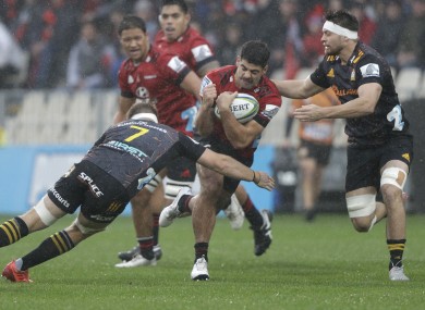 Crusaders' Billy Harmon is tackled by Sam Cane of the Chiefs during the Super Rugby Aotearoa clash in Christchurch.