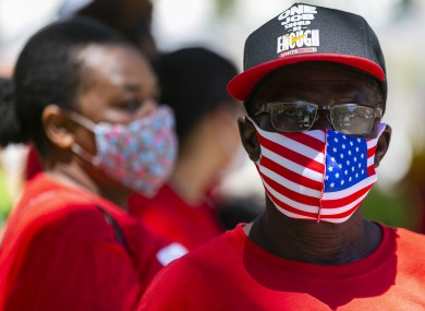 Thomas Azard (65) participates in a Strike for Black Lives protest outside Miami Beach City Hall yesterday.