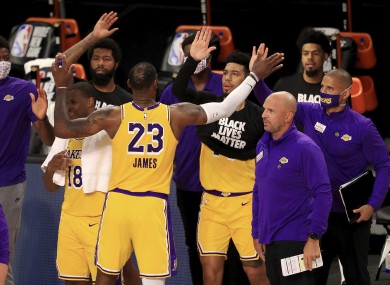 LeBron James celebrates with his team-mates