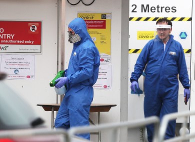 Workers from an industrial cleaning company using an electrostatic sprayer for deep cleaning at the Grangegorman East Quad construction site which closed temporarily after a worker tested positive for Covid-19 earlier this week.