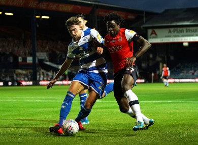 Conor Masterson (left) tackles Pelly Ruddock Mpanzu during the recent Championship game between QPR and Luton Town.