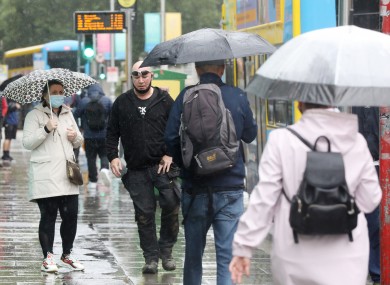 People walking in a rainy Dublin today.