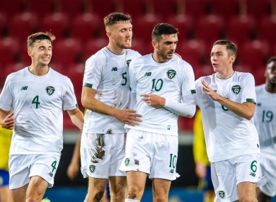 Troy Parrott celebrates with teammates after scoring against Sweden U21s.