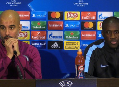 A 2017 photo of Pep Guardiola and Yaya Toure at a Manchester City press conference.