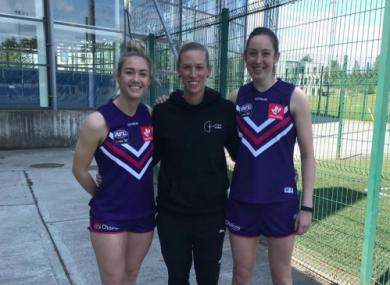 Louth's Kate Flood (left) and Leitrim's Áine Tighe (right) with CrossCoders co-founder and Western Bulldogs star Lauren Spark.