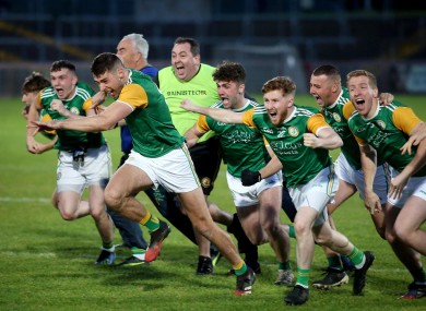 Dungannon's players celebrate after their penalty shootout win in the Tyrone final.