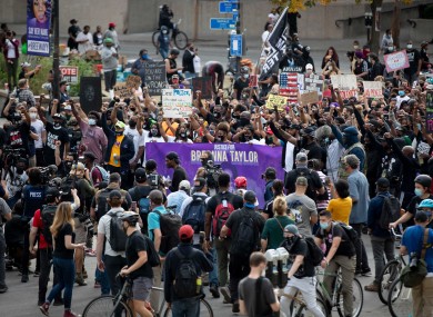 Protesters set off on a march from Jefferson Square Park in downtown Louisville on Friday