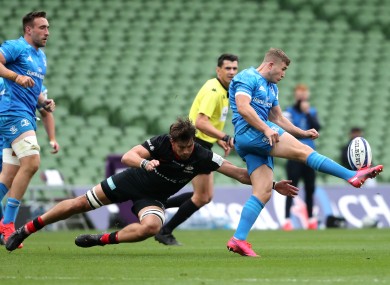 Mike Rhodes (left) tackles Jordan Larmour in last weekend's Champions Cup quarter final.