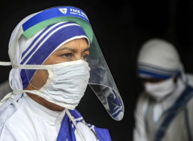Nuns wear masks and face shields in Kolkata, India.