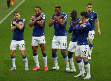 The Everton players celebrate a goal against Brighton.