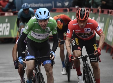 Dan Martin holds off Primoz Roglic in a sprint to the line.