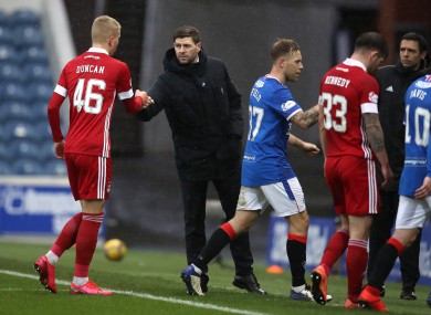 Rangers manager Steven Gerrard fist-bumps Aberdeen's Lewis Duncan following today's Scottish Premiership fixture.