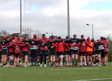 The Munster squad in a huddle during a training session.
