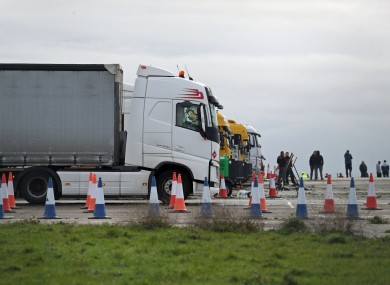 Freight lorries lined up at the front of Manston Airport runway in Kent
