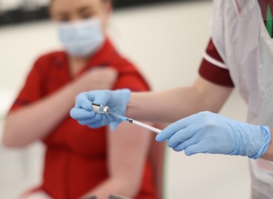 File photo. Nurse in Northern Ireland about to receive the Pfizer/BioNTech vaccine.