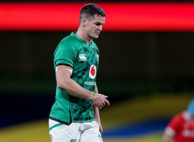Sexton leaves the pitch against Wales with an injury.