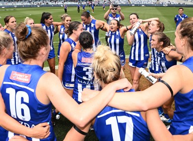 North Melbourne celebrate after their emphatic win.