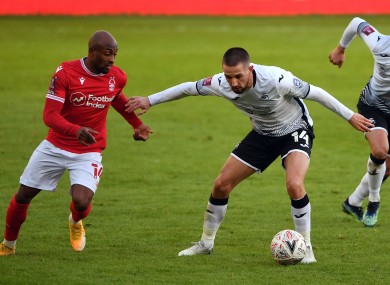 Conor Hourihane (right) under pressure from Fouad Bachirou during Swansea City's win against Nottingham Forest.