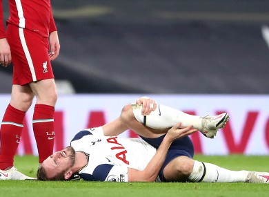 Tottenham Hotspur's Harry Kane appears in pain during the Premier League match.