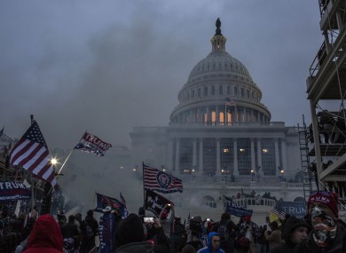 Security forces released tear gas outside the US Capitol yesterday.