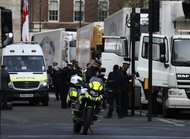 Police speak to shellfish export truck drivers as they are stopped in London