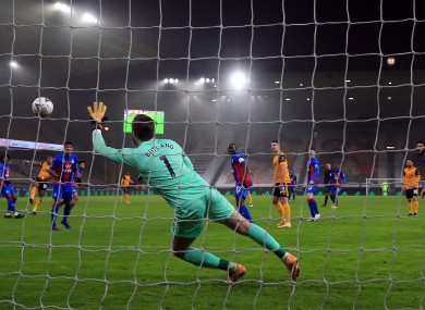 Crystal Palace goalkeeper Jack Butland can't keep out Adama Traore's shot.