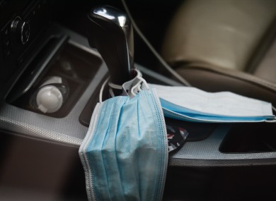 A face mask seen inside a vehicle in Dublin city center during Level 5 Covid-19 lockdown.