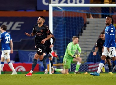 Riyad Mahrez celebrates scoring his side's second goal.