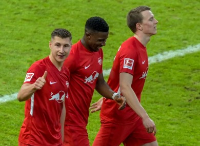 Willi Orban (l) celebrates after scoring the third goal.