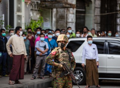 File photo. A soldier stands on guard outside an Hindu temple earlier this week.