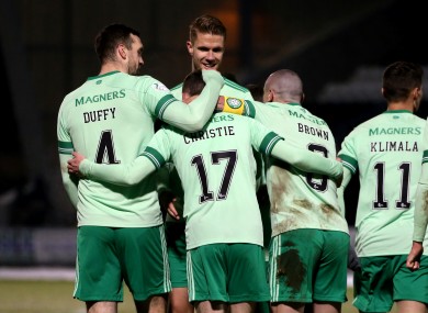 Shane Duffy celebrates with his Celtic team-mates.