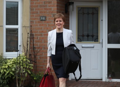 First Minister of Scotland, Nicola Sturgeon, leaves her home in Glasgow.