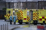 Medics in PPE and ambulances outside the ED at the Mater Hospital in Dublin