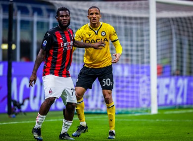 Franck Kessie of Milan with Rodrigo Becao of Udinese.