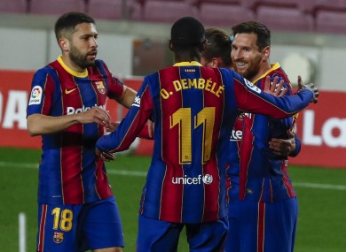 Lionel Messi celebrates with his Barcelona team-mates.