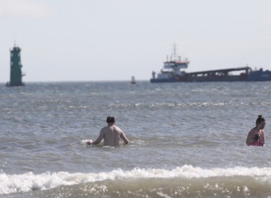 Image of people swimming in the sea in Clontarf at the end of last month.