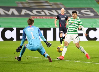 Mohamed Elyounoussi gets Celtic's third.