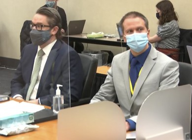 Defence attorney Eric Nelson, left, and defendant, former Minneapolis police officer Derek Chauvin listen to Hennepin County Judge Peter Cahill read instructions to the jury before closing arguments