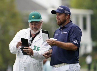 Shane Lowry with caddie Brian 'Bo' Martin on the first fairway during the second round of The Masters.