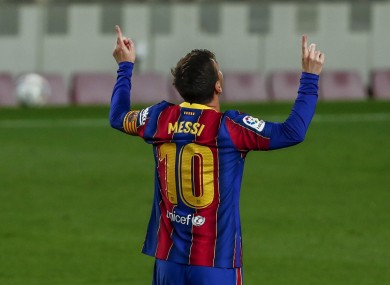Messi celebrates after scoring his second goal.