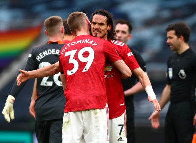 Manchester United's Scott McTominay and Edinson Cavani celebrate victory.