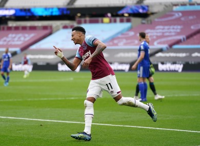 Jesse Lingard celebrates scoring.