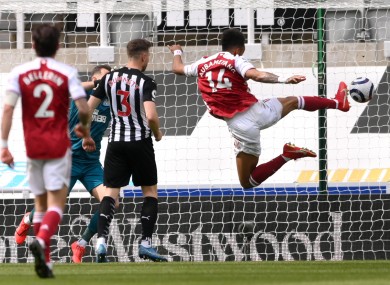 Aubameyang scores his side's second goal against Newcastle.